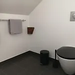 Det Gamle Apothek Apartmán *