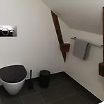 Det Gamle Apothek Apartmán *