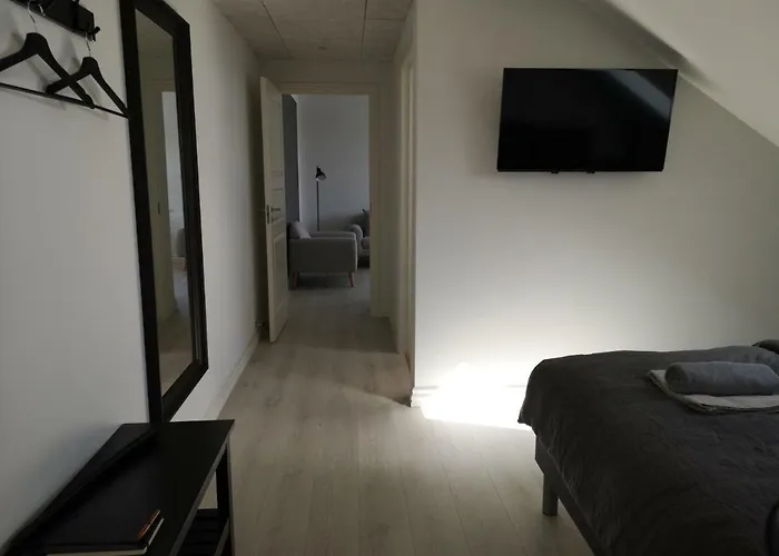 Det Gamle Apothek Apartmán *